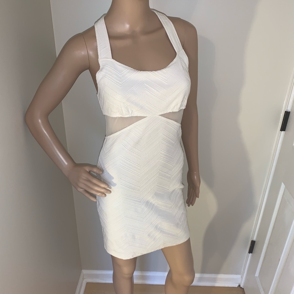 FREE PEOPLE Sexy White Dress with Mesh sides.